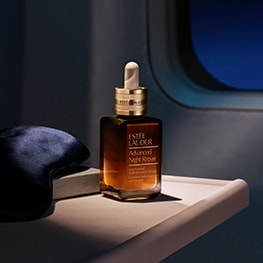 photo of advanced night repair serum on airplane in flight skincare