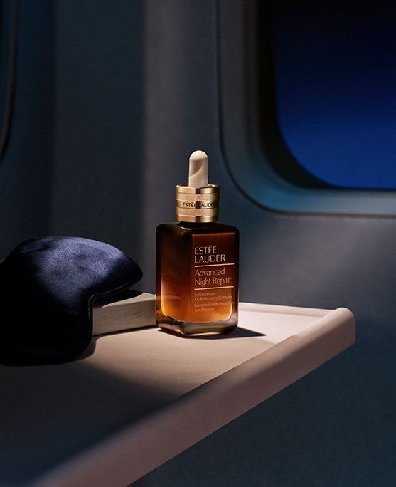 photo of advanced night repair serum on airplane in flight skincare