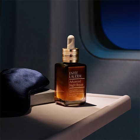 photo of advanced night repair serum on airplane in flight skincare