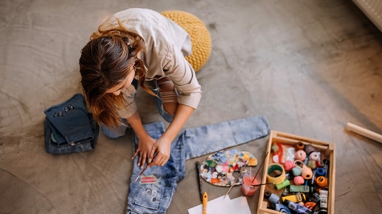 photo of woman doing hands on hobby 
