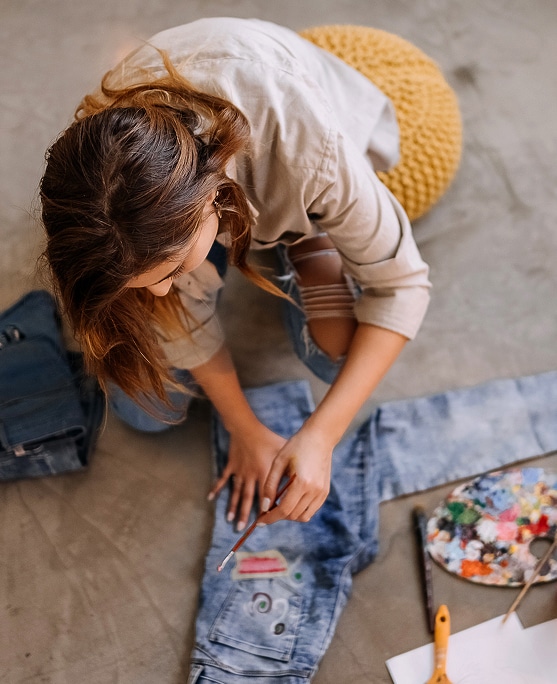 photo of woman doing hands on hobby 