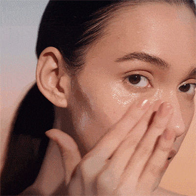 photo of woman applying spring skincare routine